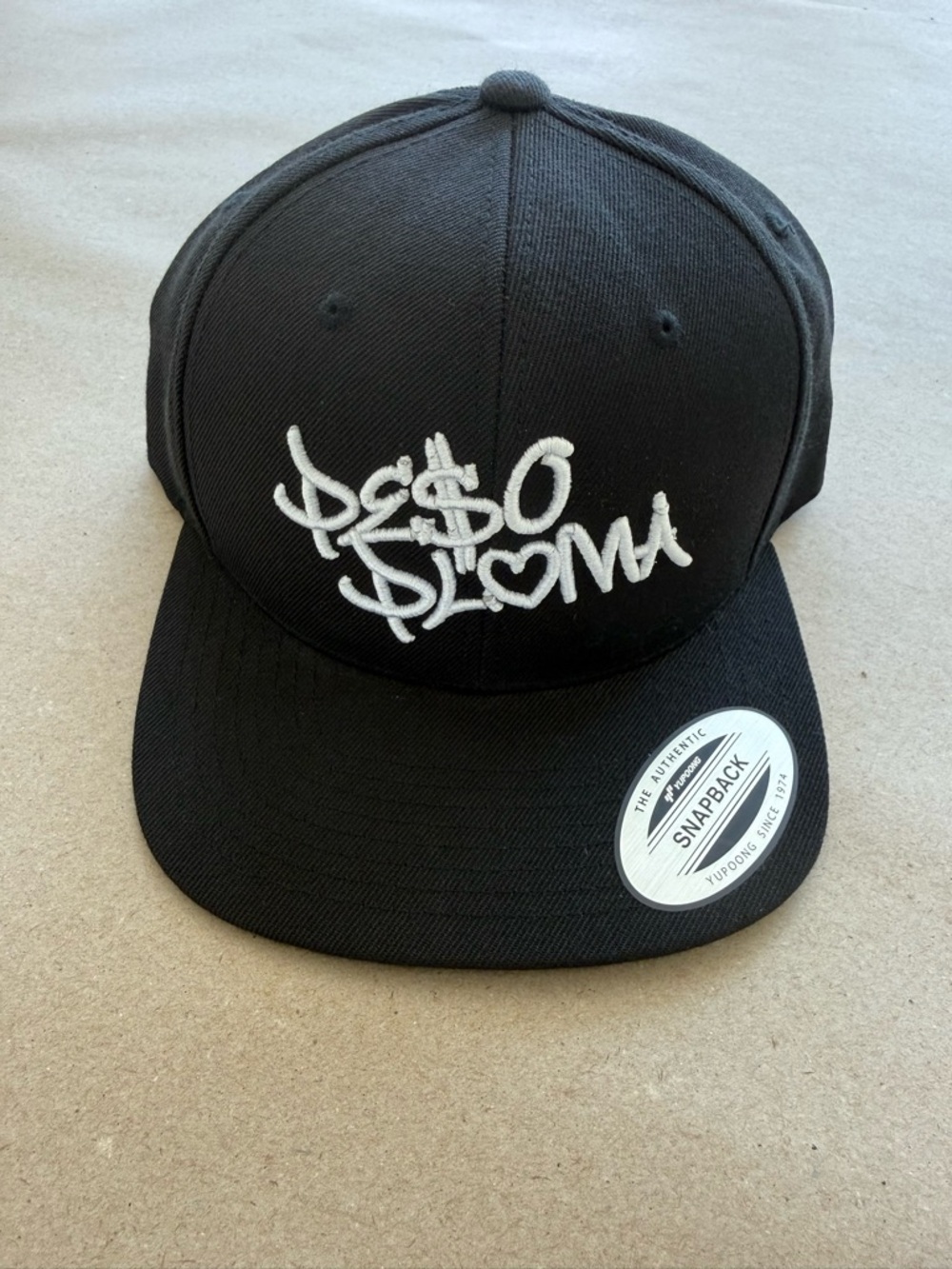 The Classics Yupoong — Peso Pluma Concert Black Snapback Hat — Size OS